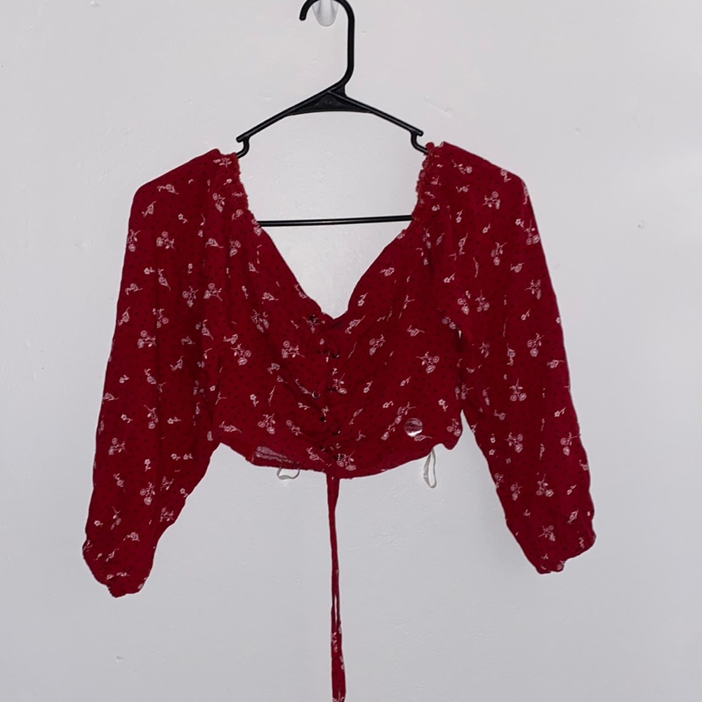 Red floral flowy sleeve tight crop top. Never worn.